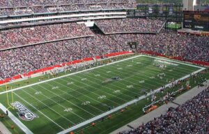 NFL Divisional Round playoff action featuring Texans vs Patriots and Rams vs Bears, with updated odds, predictions, and player prop betting insights.